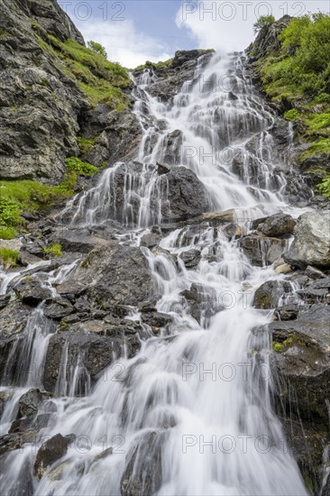Waterfall on a mountainside, long exposure, Berliner Hoehenweg, Zillertal Alps, Tyrol, Austria,