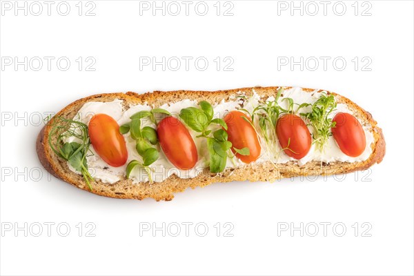 Long white bread sandwich with cream cheese, tomatoes and microgreen isolated on white background.