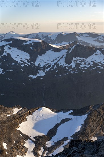 Mountain peak with Jostedalsbreen glacier in the evening light, view from the summit of Skala,