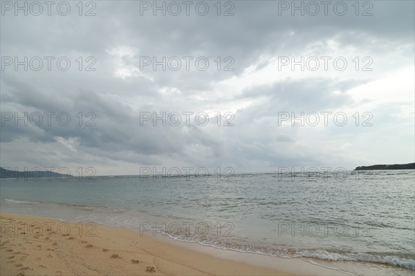 Lombok and Gili Air islands, overcast, cloudy day, sky and sea. Vacation, travel, tropics concept,
