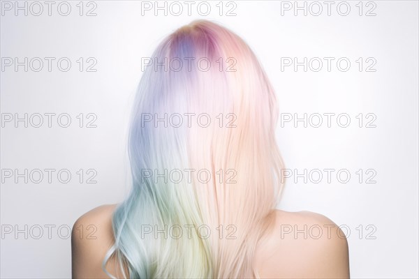 Back view of woman with rainbow pastel colored hair. KI generiert, generiert AI generated