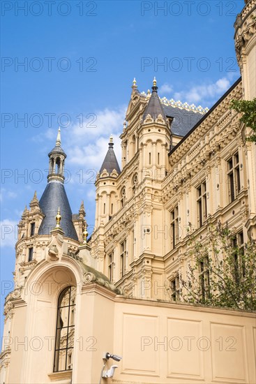 Castle lake facade of Schwerin Castle with towers and roofs, in the foreground the west bastion,