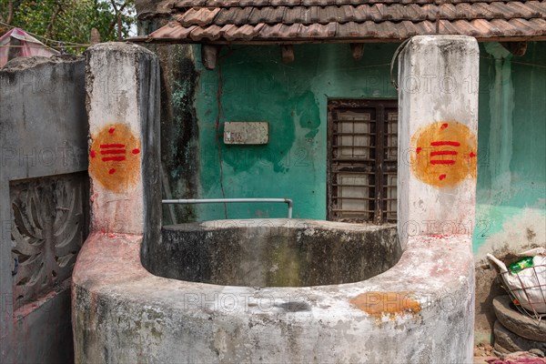Well with Tripundra, Tilaka, blessing sign, dedicated to the Hindu deity Shiva,