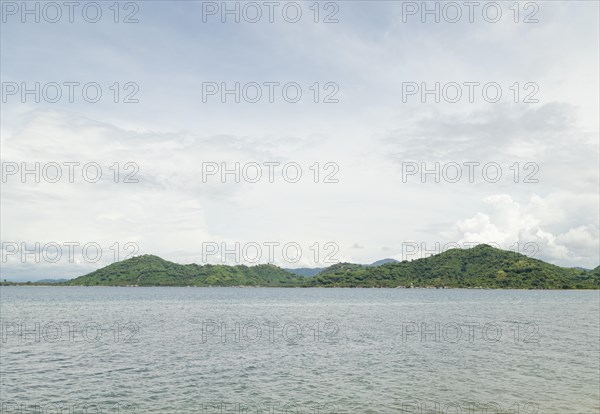 Lombok and Gili Air islands, overcast, cloudy day, sky and sea. Vacation, travel, tropics concept,