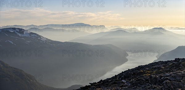 Mountains and fjord Faleidfjorden, in the evening light, view from the top of Skala, Loen, Norway,