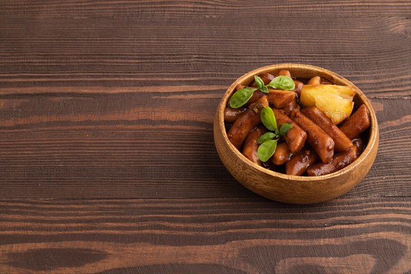 Tteokbokki or Topokki, fried rice cake stick, popular Korean street food with spicy jjajang sauce