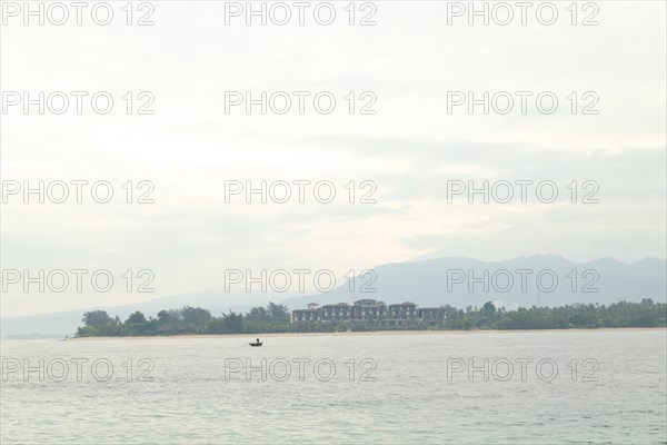 Lombok and Gili Air islands, overcast, cloudy day, sky and sea. Vacation, travel, tropics concept,