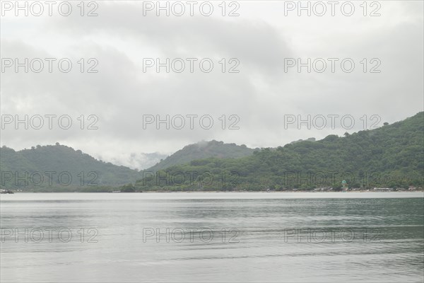 Lombok and Gili Air islands, overcast, cloudy day, sky and sea. Vacation, travel, tropics concept,