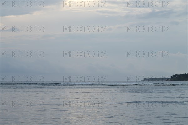 Lombok and Gili Air islands, overcast, cloudy day, sky and sea. Vacation, travel, tropics concept,
