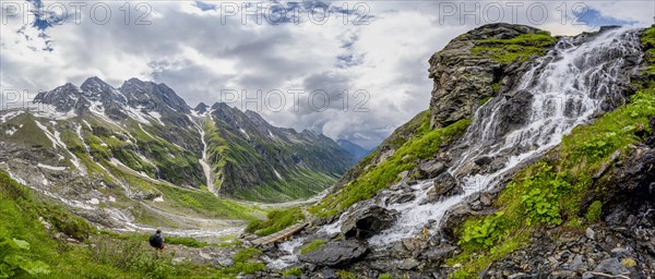 Panorama, green mountain valley Floitengrund with mountain stream Floitenbach, mountaineer on a