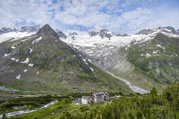 Picturesque mountain landscape, mountain hut Berliner Huette, mountain summit Steinmandl, summit