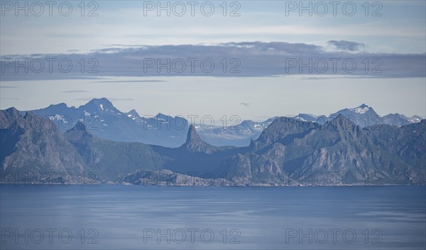 Sea Vestfjorden and mountain peaks on the coast, view from the top of Dronningsvarden or
