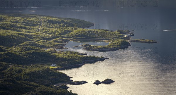 Coast in atmospheric evening light, view from the summit of Dronningsvarden or Stortinden,