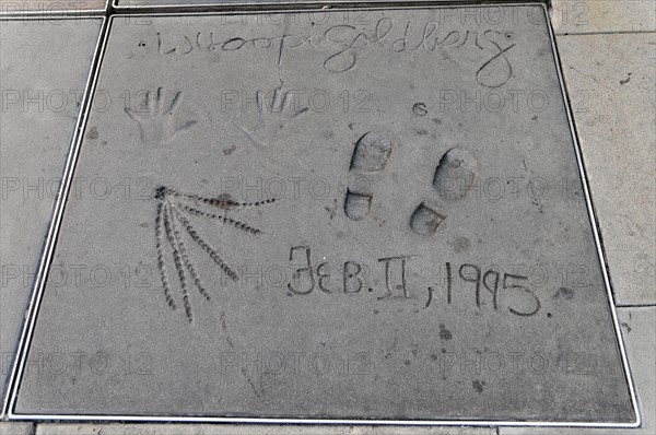 Handprints and footprints of WHOOPI GOLDBERG, Hollywood Boulevard, Los Angeles, California, USA,