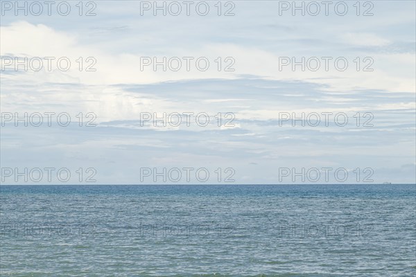 Lombok and Gili Air islands, overcast, cloudy day, sky and sea. Vacation, travel, tropics concept,