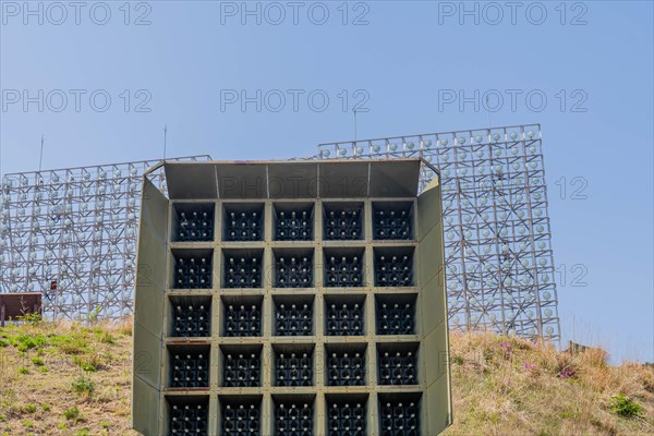 Military array of loud speakers and spot lights on hill overlooking DMZ observation area in