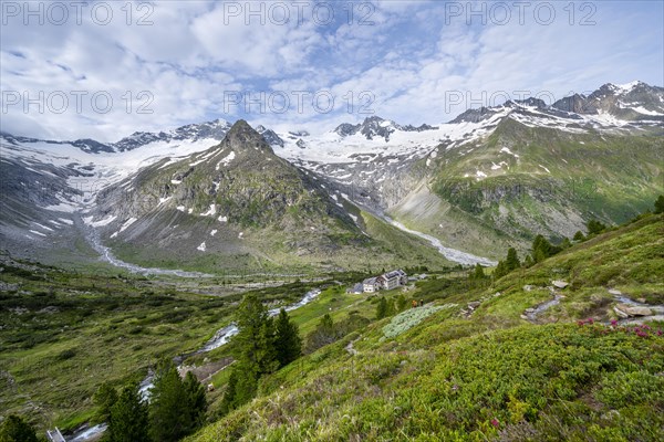 Picturesque mountain landscape, mountain hut Berliner Huette, mountain summit Steinmandl, summit