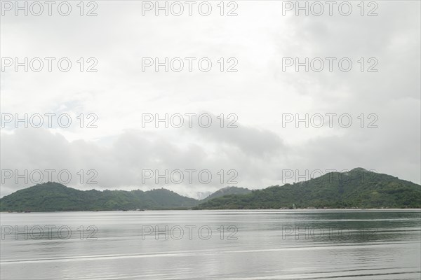 Lombok and Gili Air islands, overcast, cloudy day, sky and sea. Vacation, travel, tropics concept,