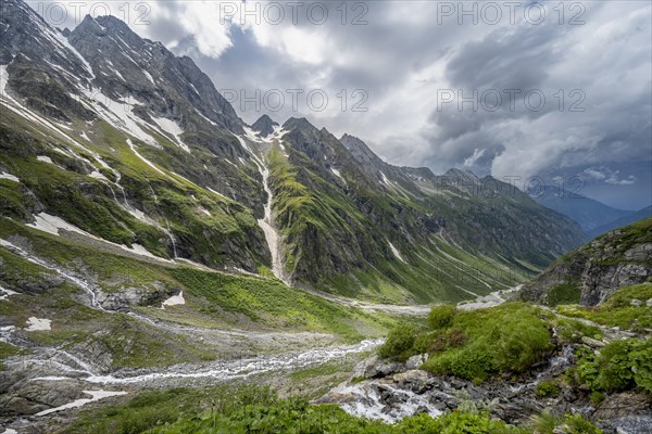 Green mountain valley Floitengrund with mountain stream Floitenbach, ascent to Greizer Huette,