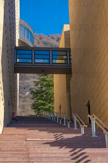 Modern Design Building with Staircase and Covered Bridge and Mountain in Campione d'Italia,