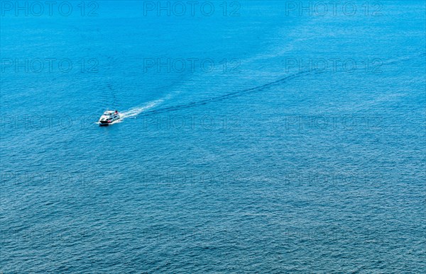 Unidentified ferry crossing open water near Jeju Island in South Korea
