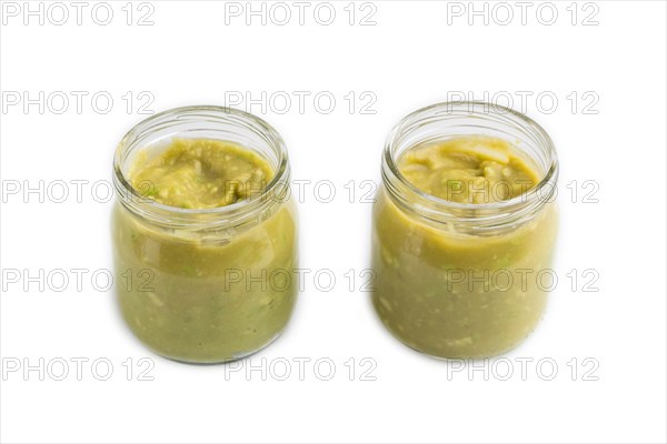 Baby puree with vegetable mix, broccoli, tomatoes, cucumber, avocado infant formula in glass jar
