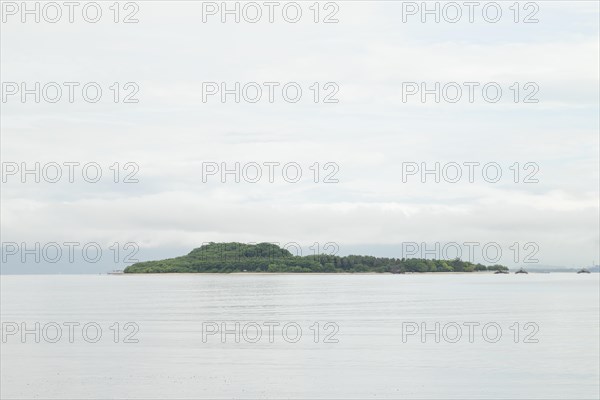 Lombok and Gili Air islands, overcast, cloudy day, sky and sea. Vacation, travel, tropics concept,