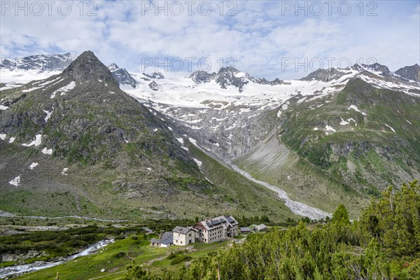 Picturesque mountain landscape, mountain hut Berliner Huette, mountain summit Steinmandl, summit