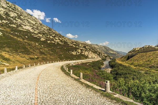 Gotthard Pass, mountain landscape and old pass road with cobblestones, Canton Ticino, Switzerland,