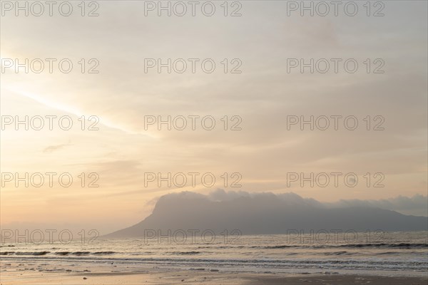 Bako national park, sea sandy beach, overcast, cloudy sunset, sky and sea, low tide. Vacation,