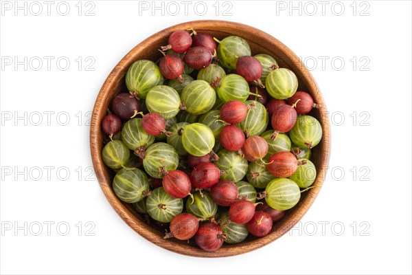 Fresh red and green gooseberry in wooden bowl isolated on white background. top view, flat lay,
