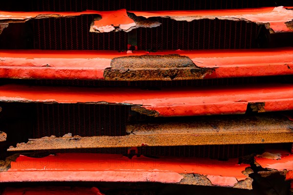 Rusty red lorry radiator, abandoned herring factory Djupavik, Reykjarfjoerour, Strandir, Arnes,