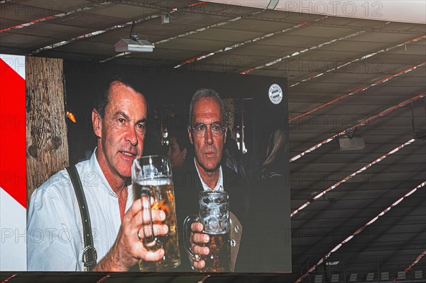 Picture of Franz Beckenbauer and Otmar Hitzfeld on the scoreboard, FC Bayern Munich funeral service
