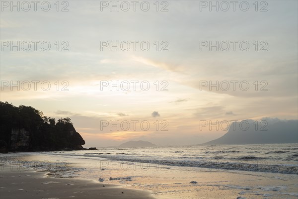 Bako national park, sea sandy beach, overcast, cloudy sunset, sky and sea, low tide. Vacation,