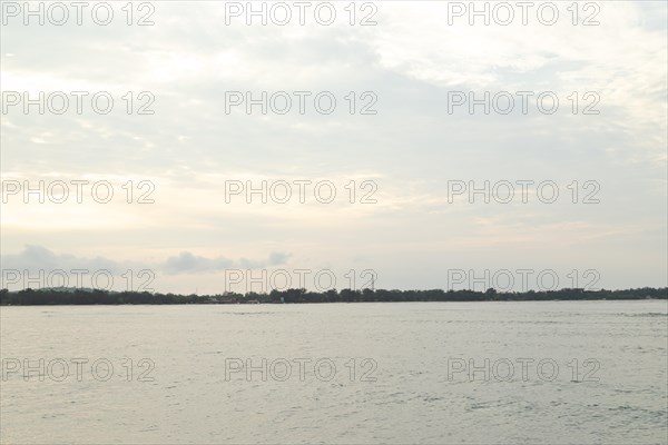 Lombok and Gili Air islands, overcast, cloudy day, sky and sea. Vacation, travel, tropics concept,