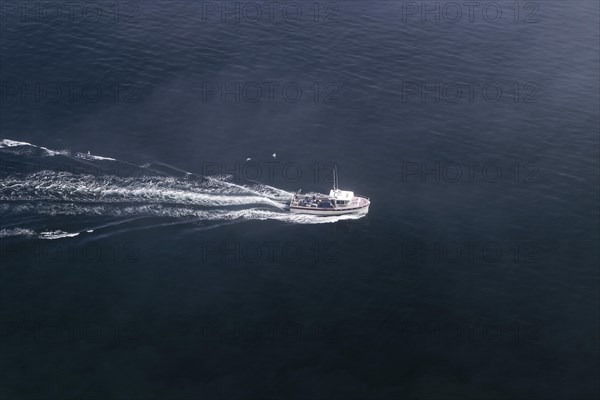 Coastal seascape, fishing boat in fog, Gulf of Saint Lawrence, Province of Quebec, Canada, sea,
