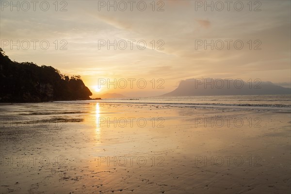 Bako national park, sea sandy beach, overcast, cloudy sunset, sky and sea, low tide. Vacation,