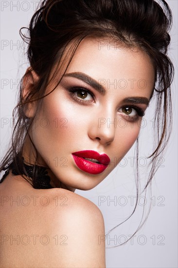 Gorgeous Young Brunette Woman face portrait. Beauty Model Girl with bright eyebrows, perfect