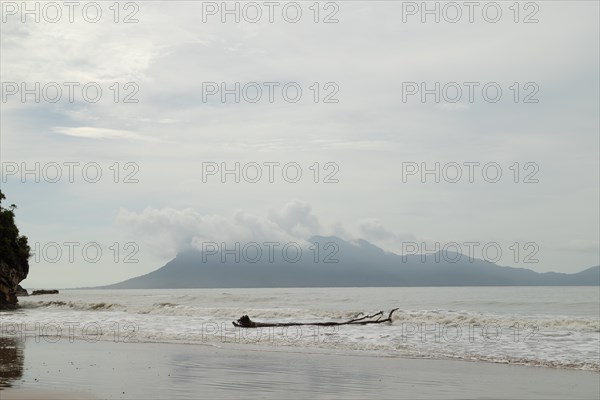 Bako national park, sea sandy beach, overcast, cloudy day, sky and sea. Vacation, travel, tropics