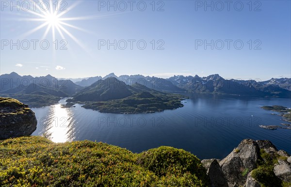 View of Ulvagsundet fjord and mountains, view from the summit of Dronningsvarden or Stortinden,