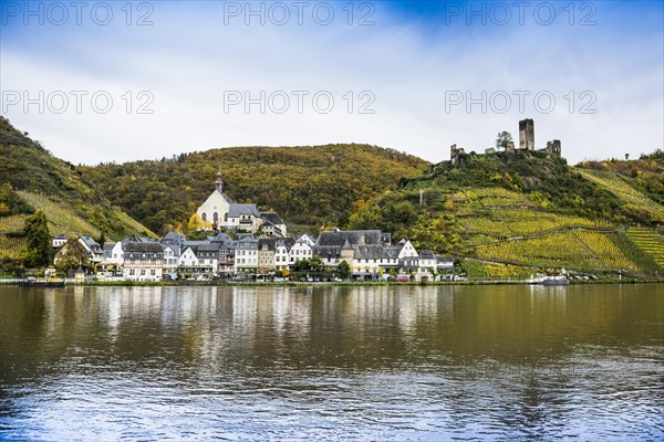 Vineyards in autumn colours and picturesque village, Beilstein, Moselle, Rhineland-Palatinate,