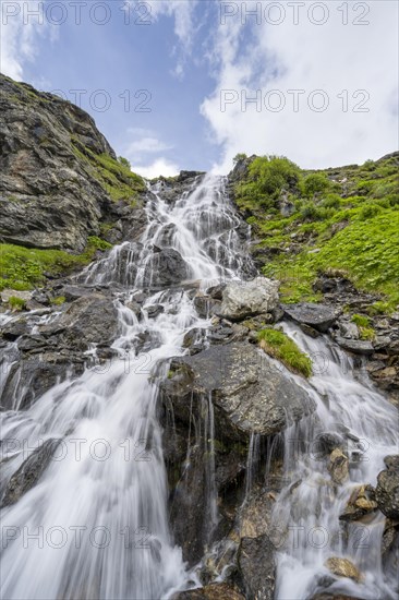 Waterfall on a mountainside, long exposure, Berliner Hoehenweg, Zillertal Alps, Tyrol, Austria,