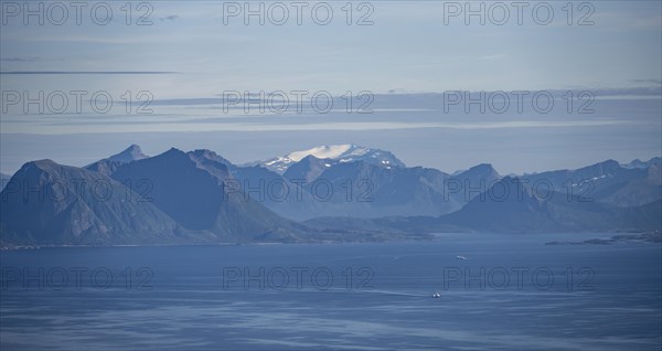 Sea Vestfjorden and mountain peaks on the coast, view from the top of Dronningsvarden or