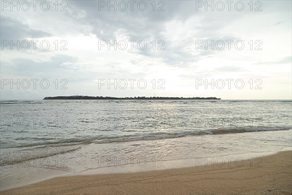 Lombok and Gili Air islands, overcast, cloudy day, sky and sea. Vacation, travel, tropics concept,