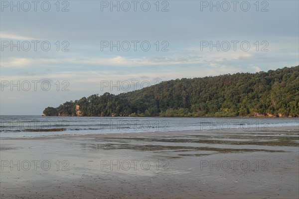 Bako national park, sea sandy beach, overcast, cloudy day, sky and sea. Vacation, travel, tropics