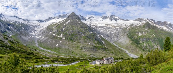 Picturesque mountain landscape, mountain hut Berliner Huette, mountain summit Steinmandl, summit