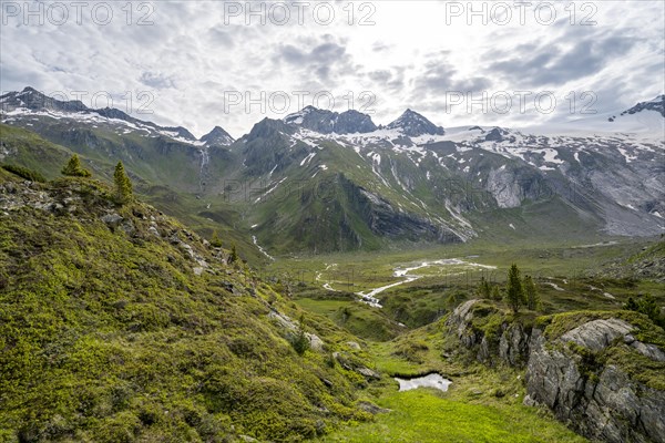 Picturesque mountain landscape, mountain summit with snow and glacier Schwarzensteinkees, summit