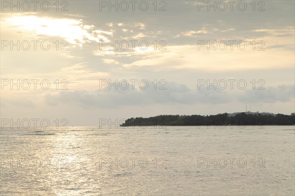 Lombok and Gili Air islands, overcast, cloudy day, sky and sea. Vacation, travel, tropics concept,