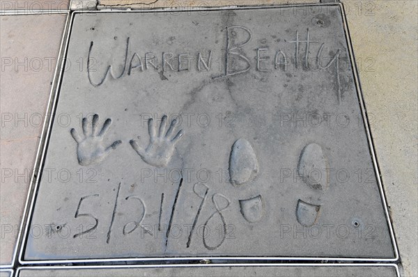 Handprints and footprints of WARREN BEATTY, Hollywood Boulevard, Los Angeles, California, USA,