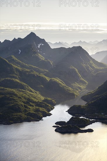 Fjord landscape with atmospheric evening light, Ulvagfjorden fjord and mountains, view from the top